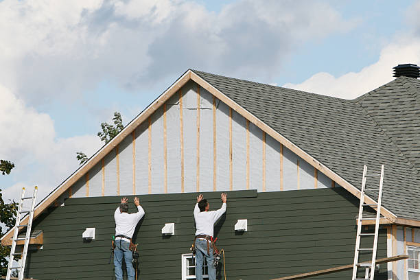 Professional Siding technician working in South Park, PA
